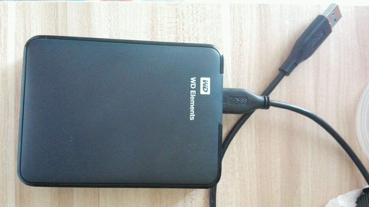 使用移动硬盘时,为什么不建议插在台式机前置USB接口上?